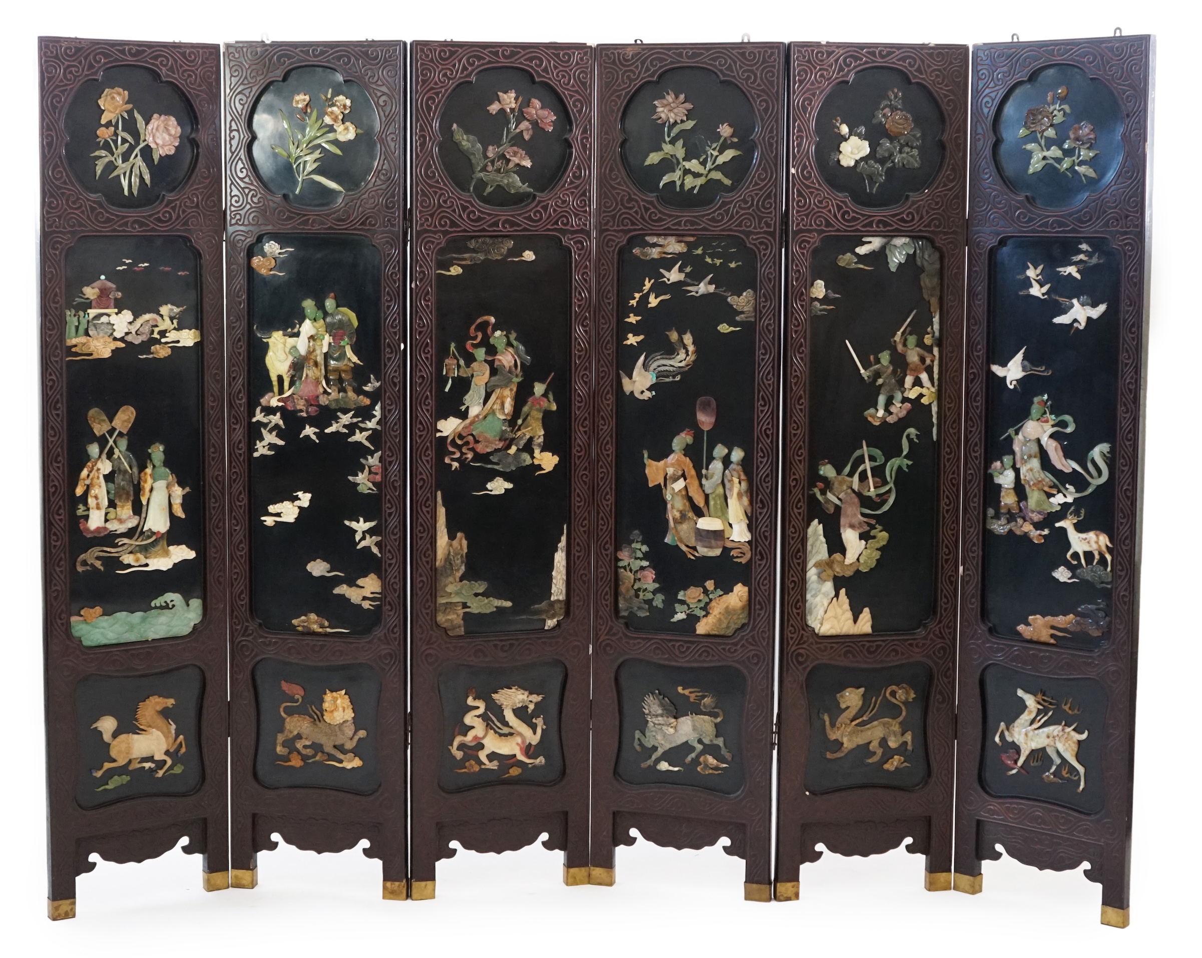 A Chinese tixi lacquer and carved soapstone overlaid six panel screen, mid 20th century